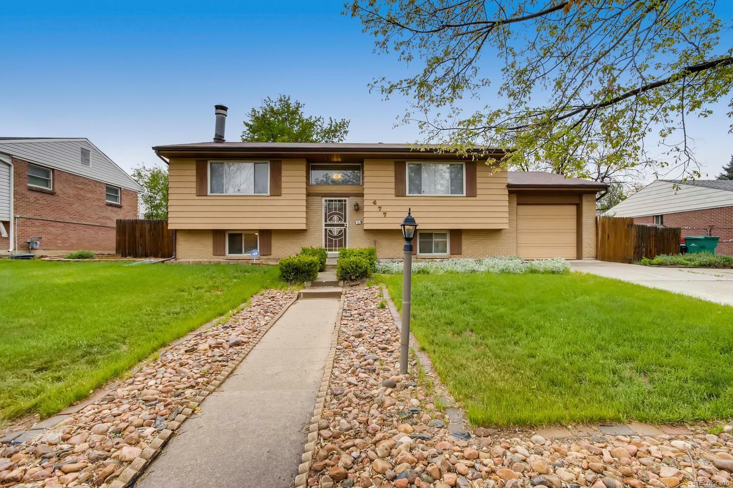 Property Photo:  477 Salem Street  CO 80011 