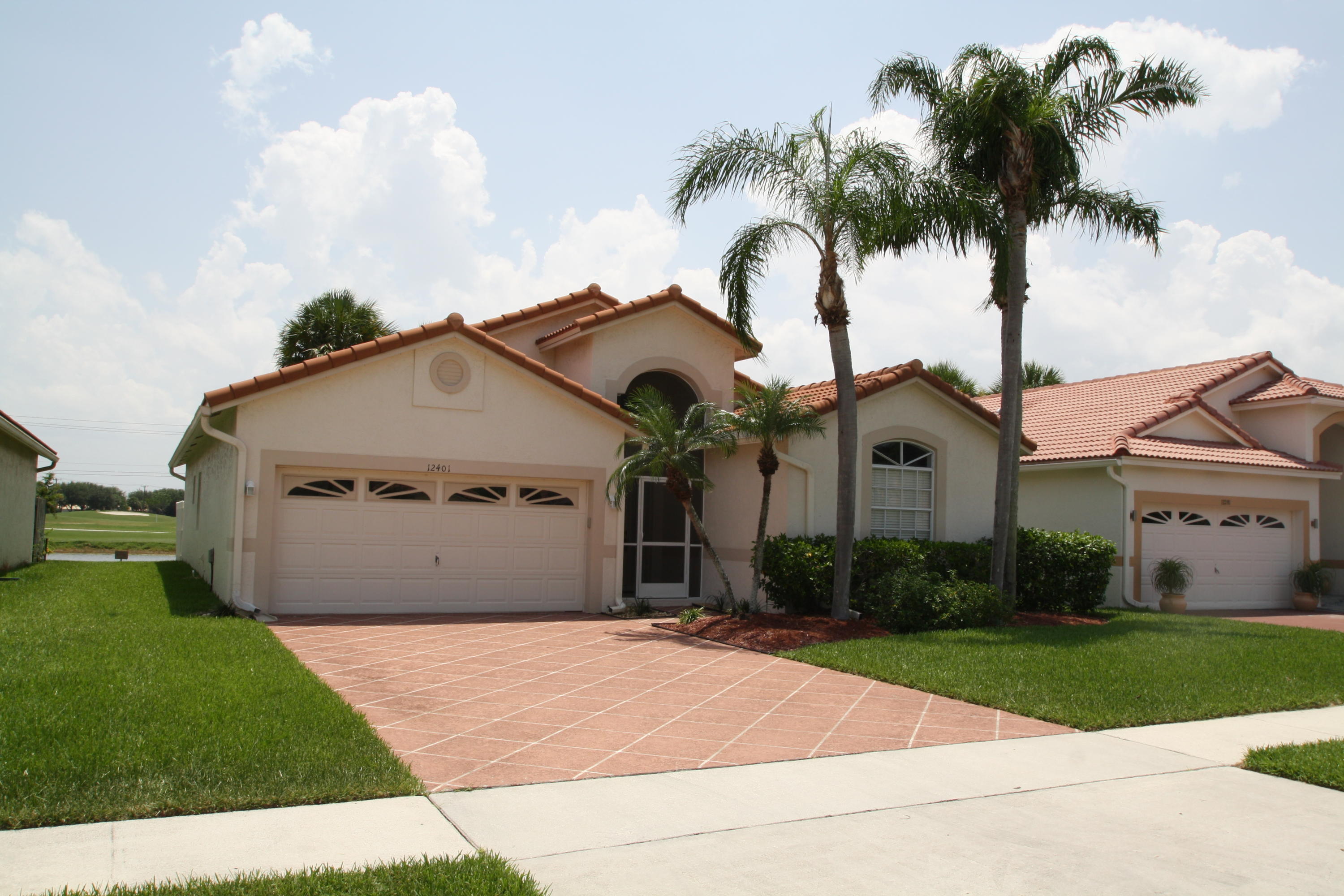 Property Photo: 12401 Sand Wedge Drive FL 33437