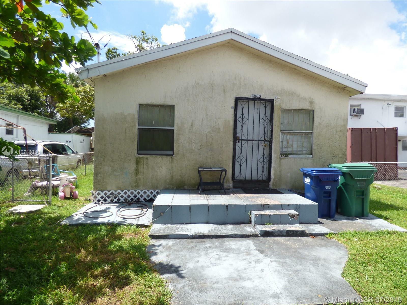 Property Photo: 1880 NW 65th St FL 33147