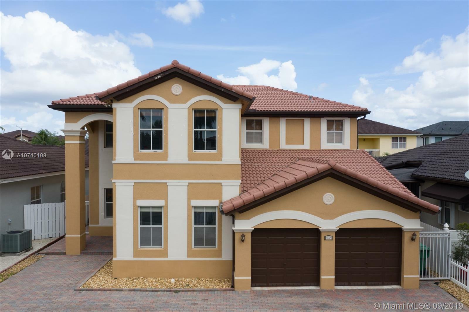 Property Photo:  8869 NW 179 Ln  FL 33018 