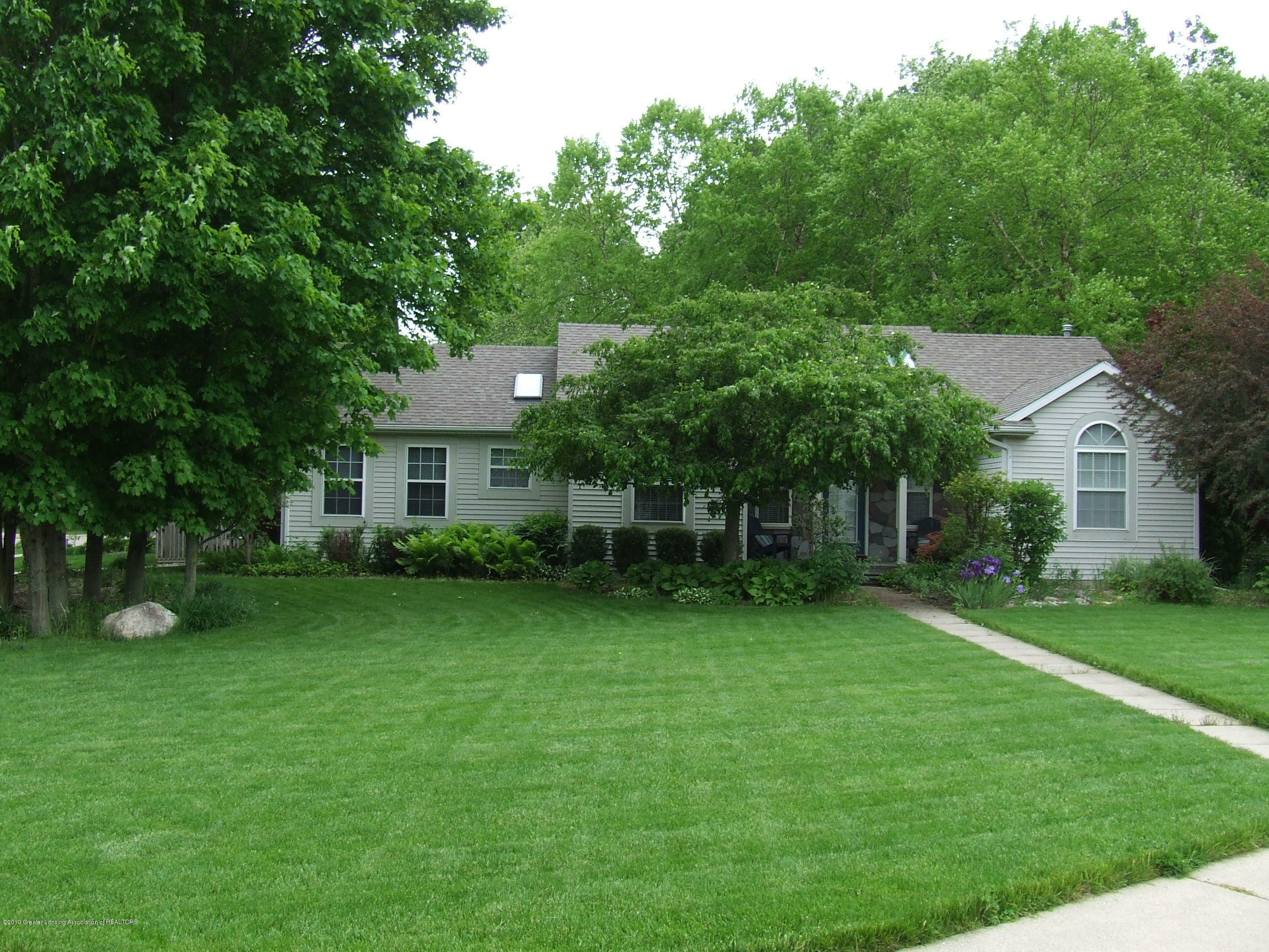 Property Photo:  3895 Knotwood Drive  MI 48842 