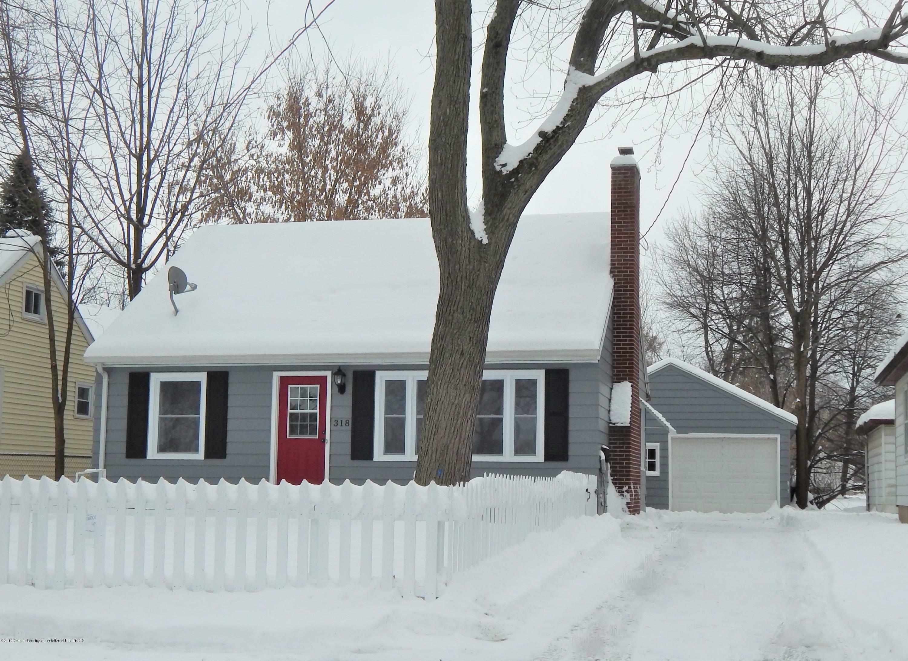 Property Photo:  318 E Rouse Street  MI 48910 