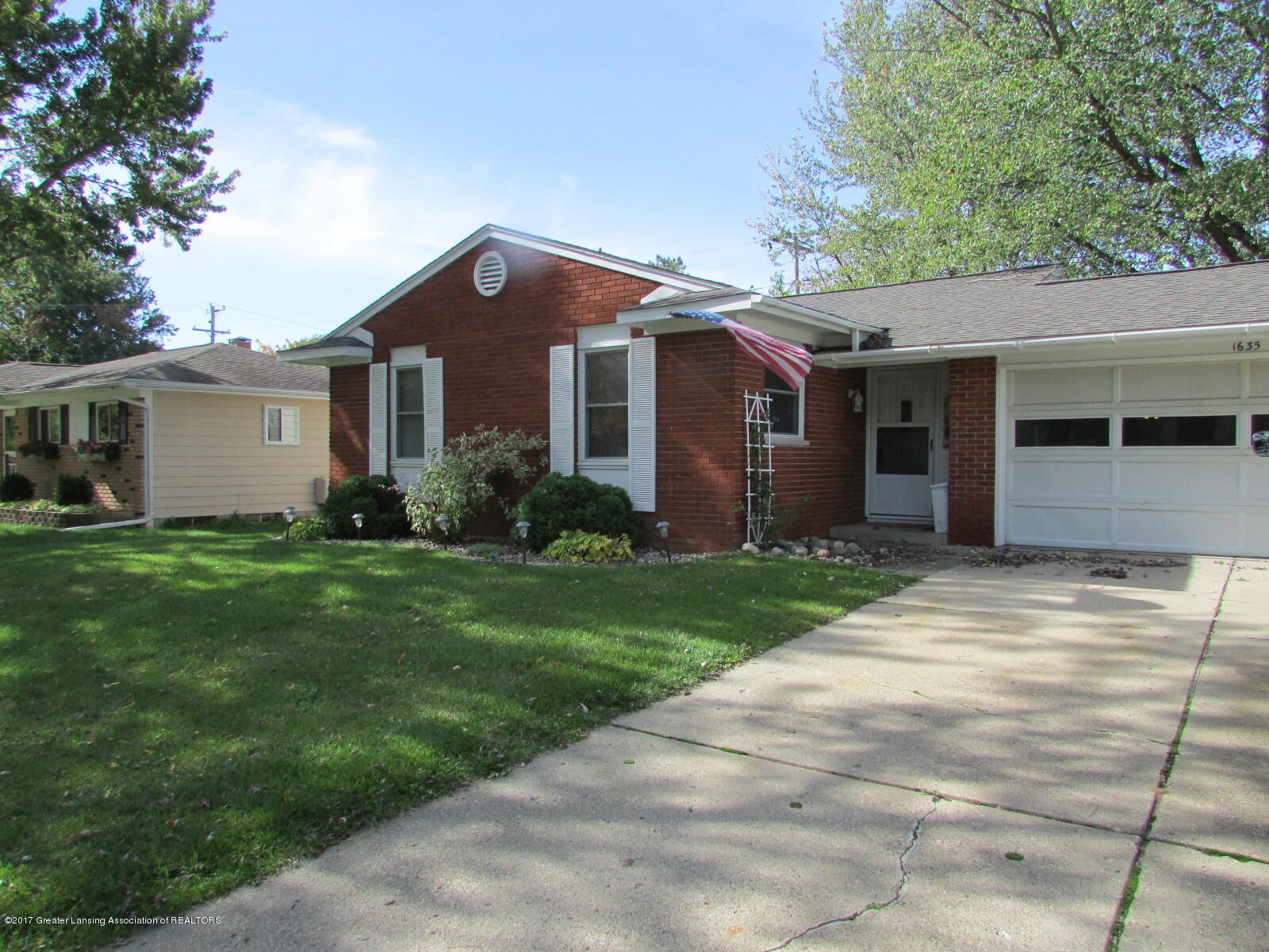 Property Photo:  1635 Grayfriars  MI 48842 