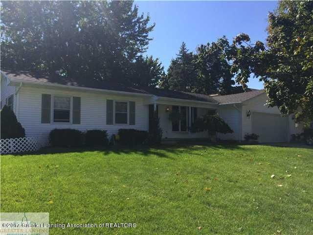 Property Photo:  10082 Burgundy Boulevard  MI 48821 