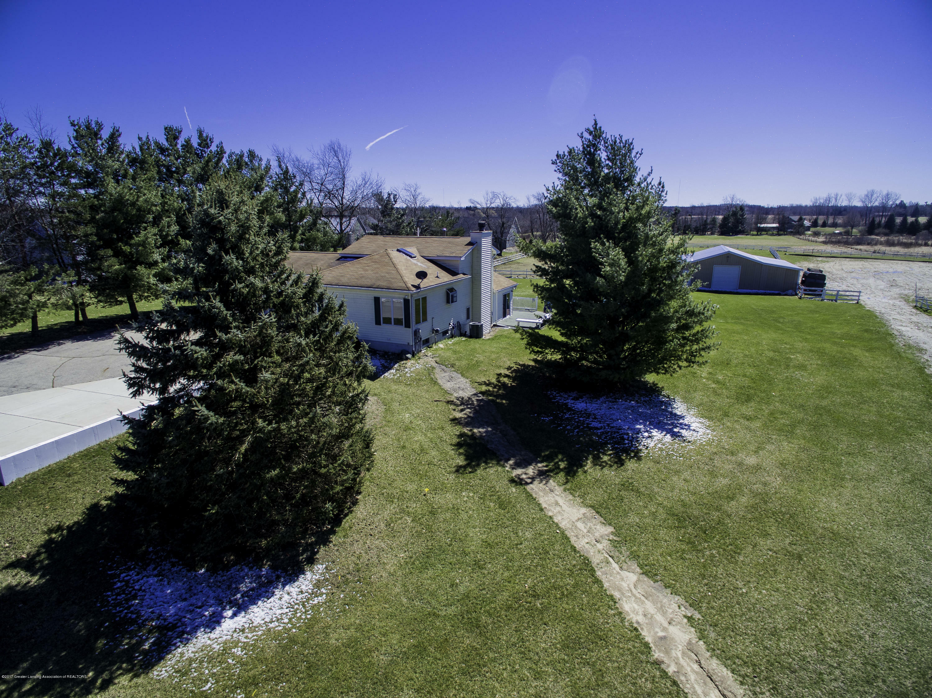 Property Photo:  575 Piper Road  MI 48840 