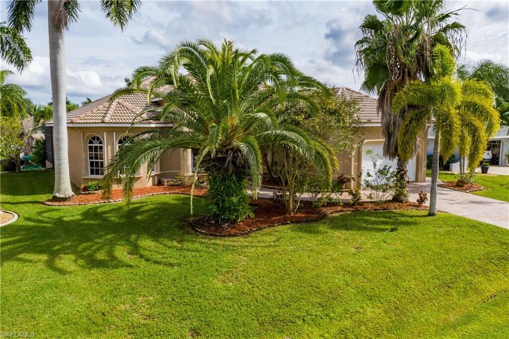 Property Photo: 5001 SW 9th Pl FL 33914