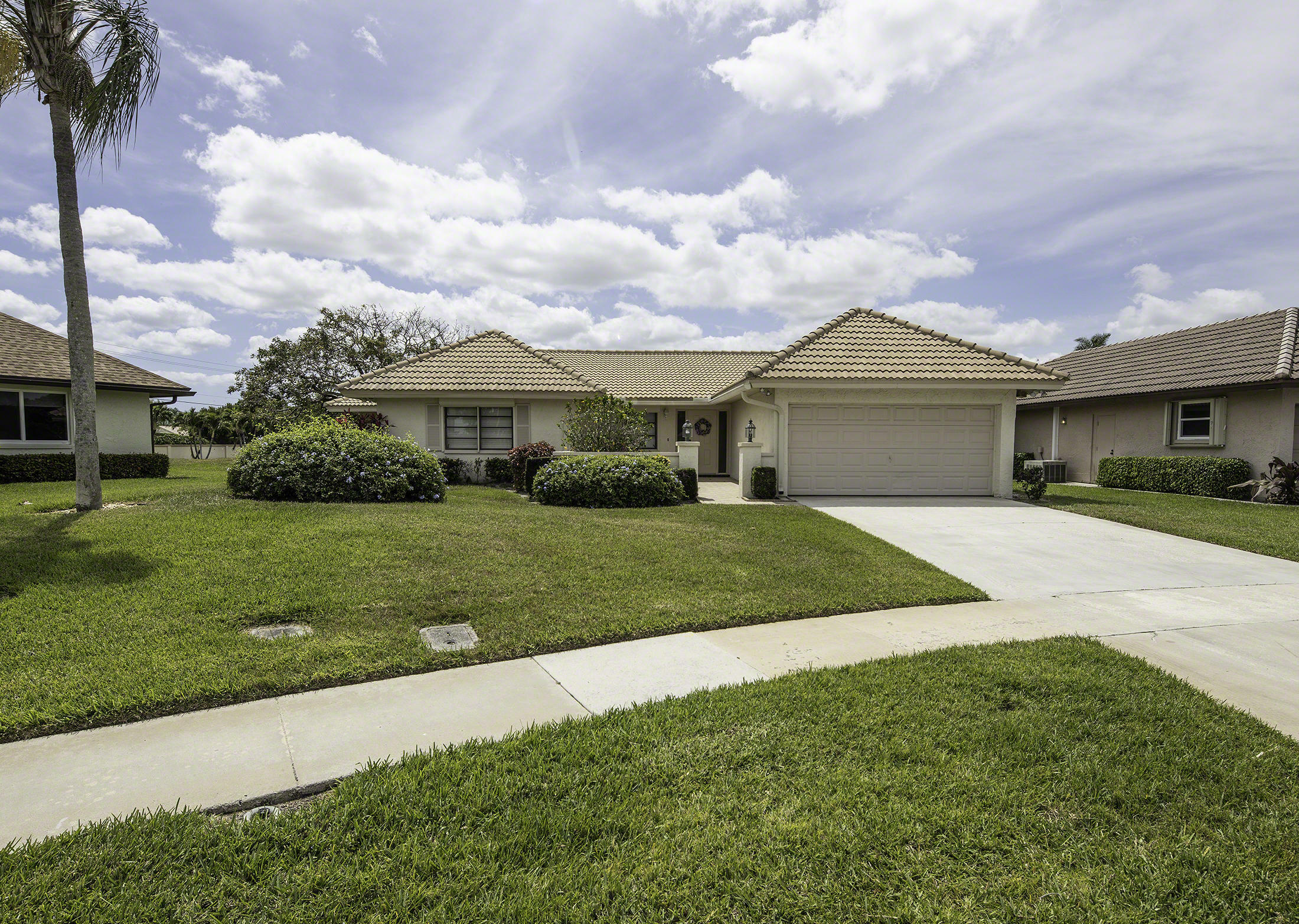 Property Photo:  10338 Greentrail Drive N  FL 33436 