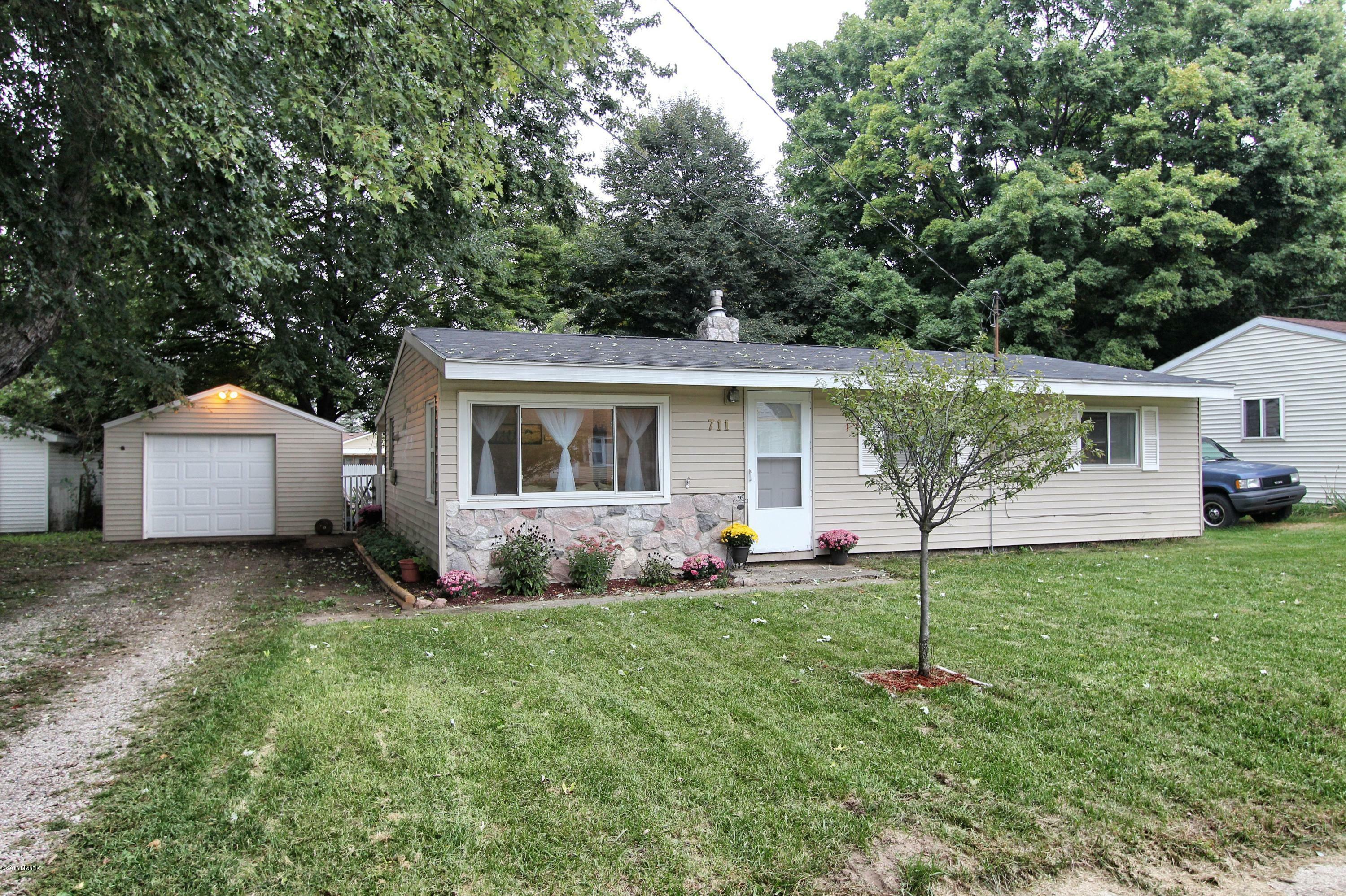 Property Photo:  711 E Main Street  MI 49333 