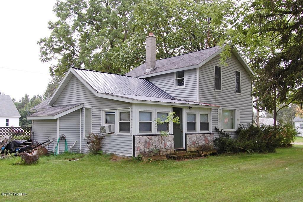 Property Photo:  8329 5 Mile Road  MI 49332 