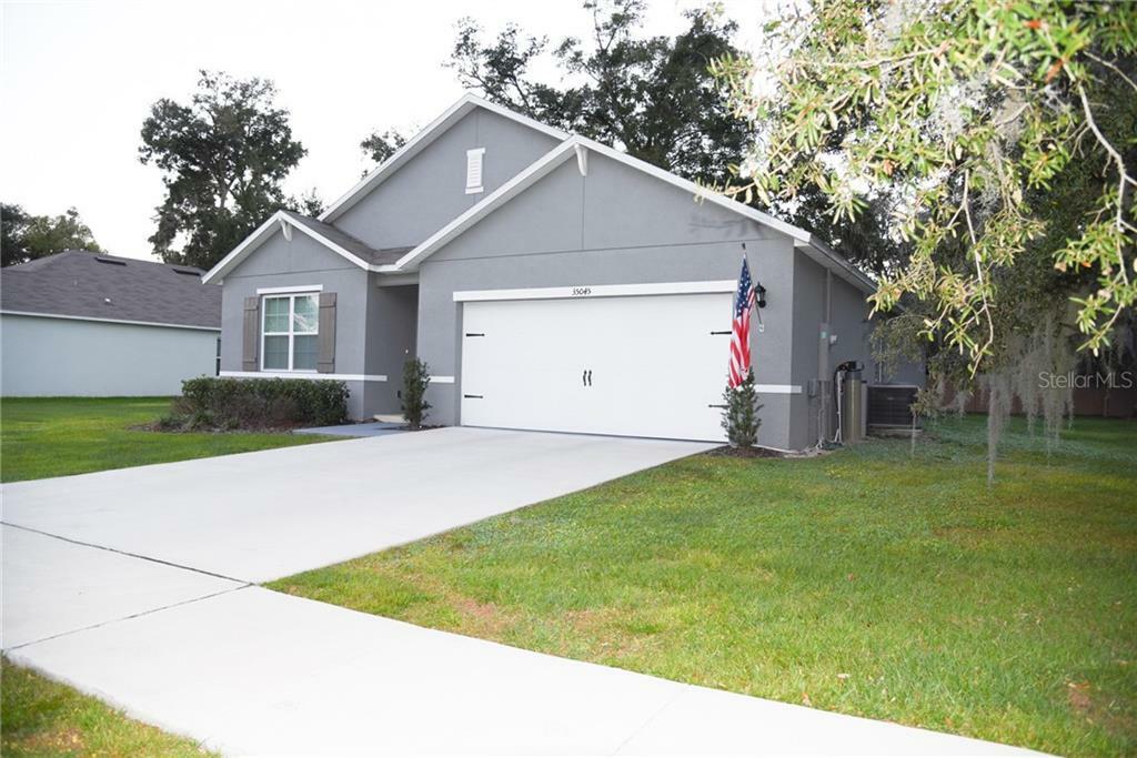 Property Photo:  35045 Sweet Leaf Lane  FL 34788 