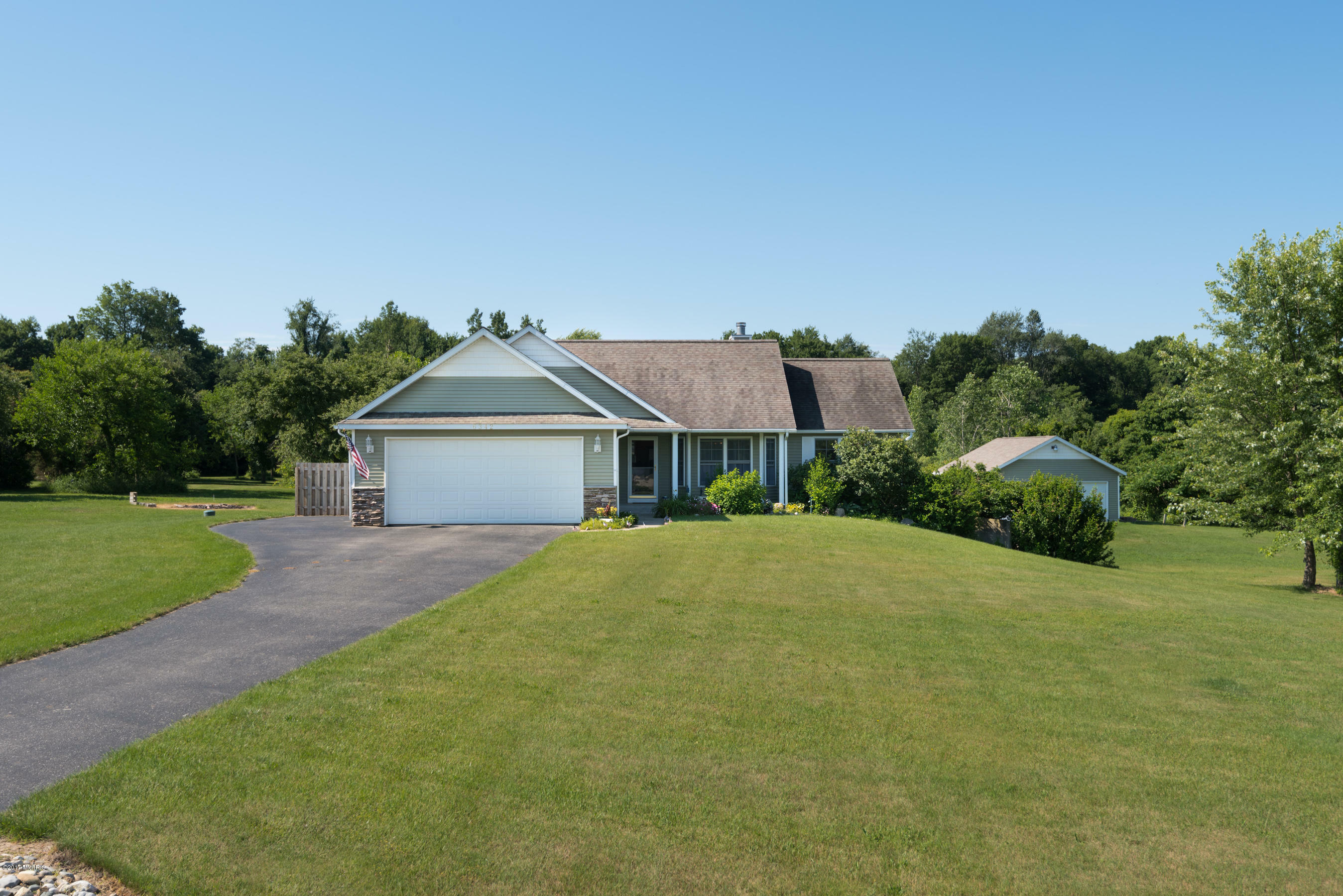 Property Photo:  6342 Orchard Trail  MI 49408 