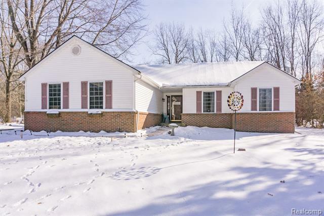 Property Photo:  5071 Edward James Drive  MI 48843 