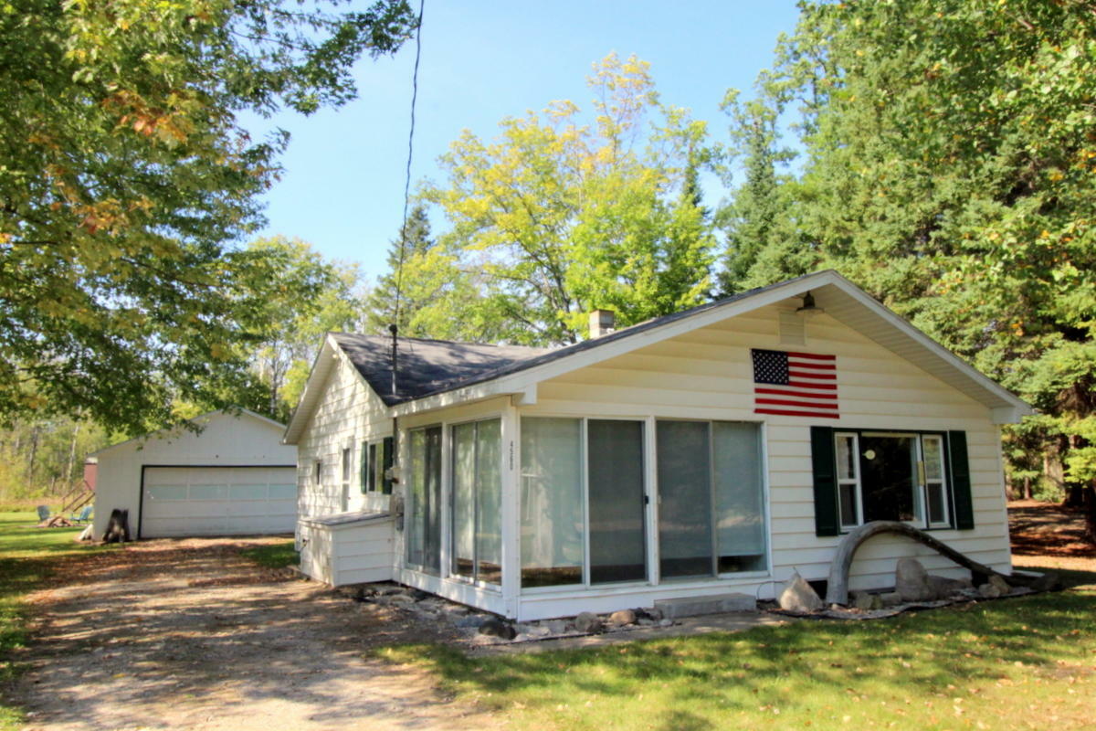 Property Photo:  4560 Club Road  MI 49749 