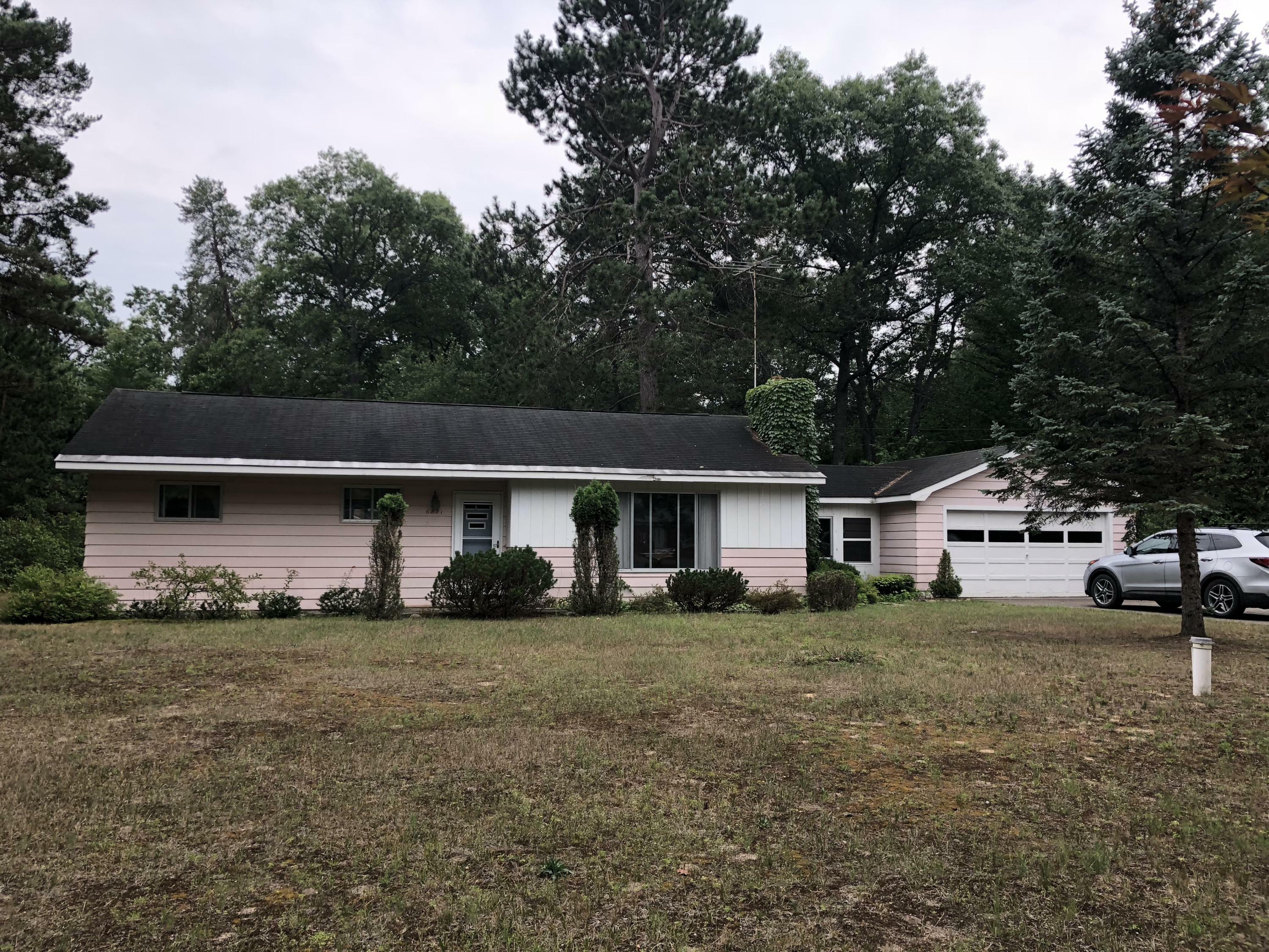 Property Photo:  6891/6853 Fisher Woods Road  MI 49749 