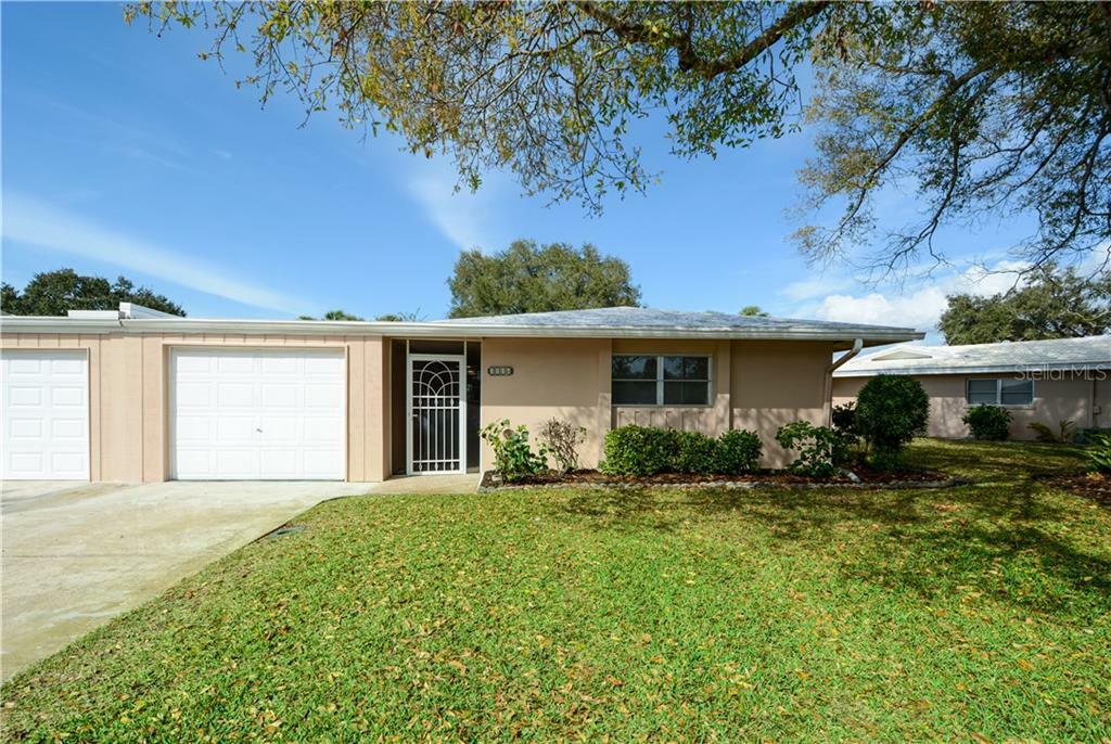 Property Photo: 3116 Village Green Drive 1122 FL 34239