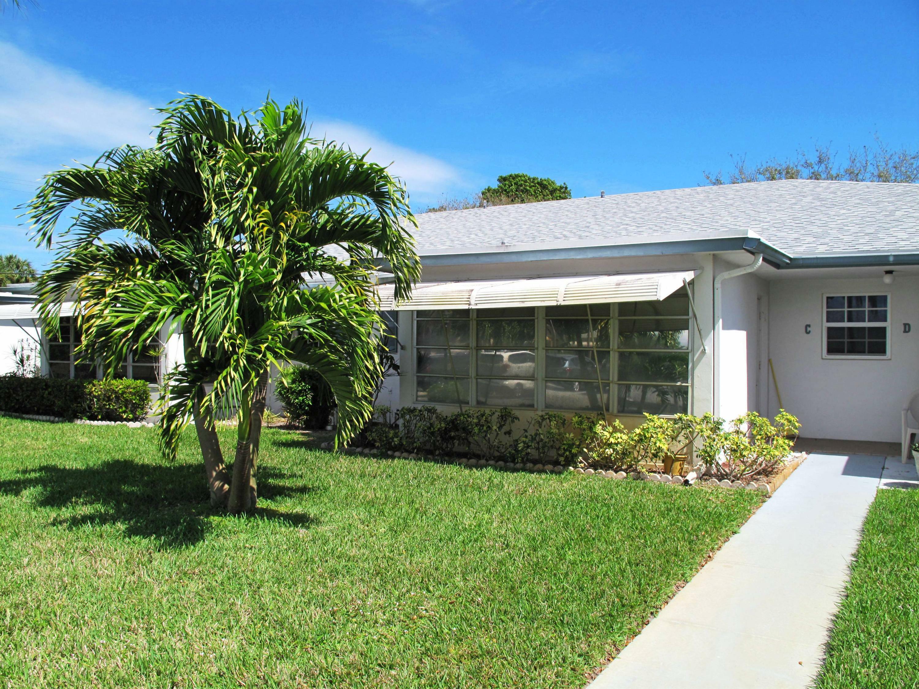 Property Photo:  1062 North Drive C  FL 33445 