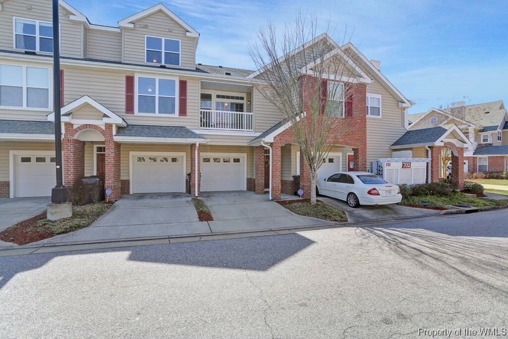 Property Photo:  702 River Rock Way 108  VA 23608 