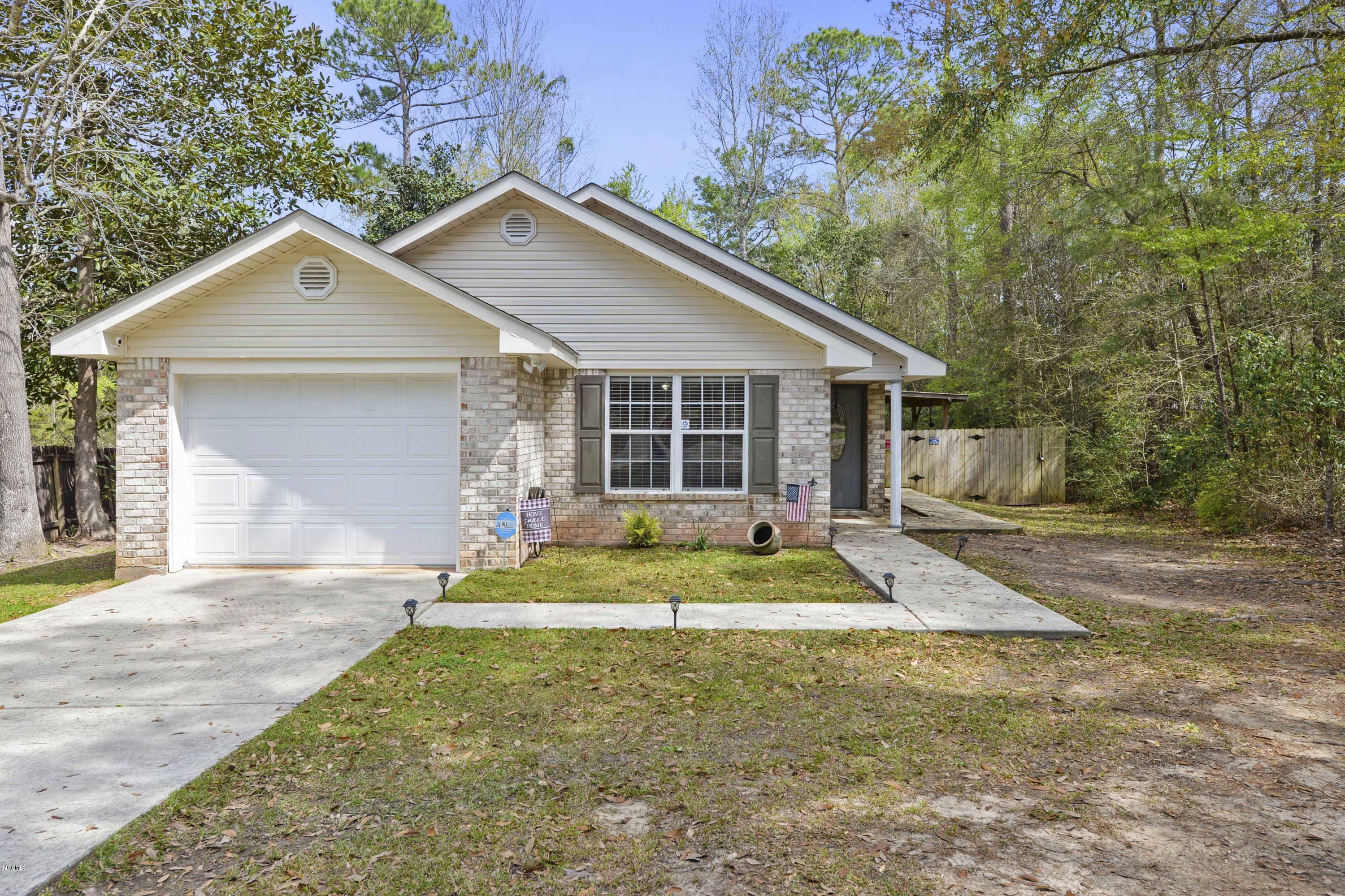 Property Photo: 10763 Lilinoe Way MS 39525