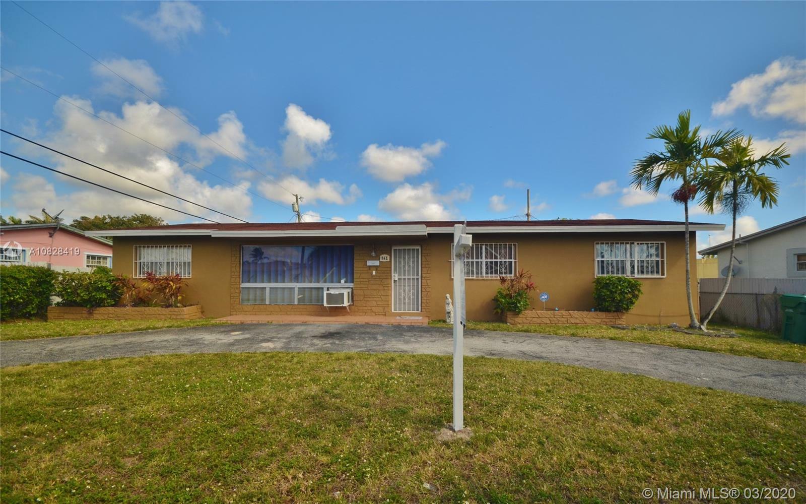 Property Photo:  861 NW 174th St  FL 33169 