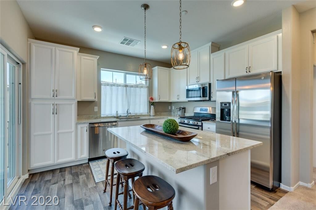 Property Photo:  8469 Insignia Avenue 106  NV 89178 