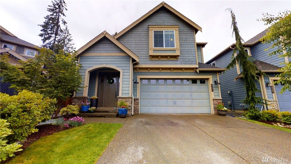 Property Photo:  19602  2nd Drive SE 52  WA 98012 