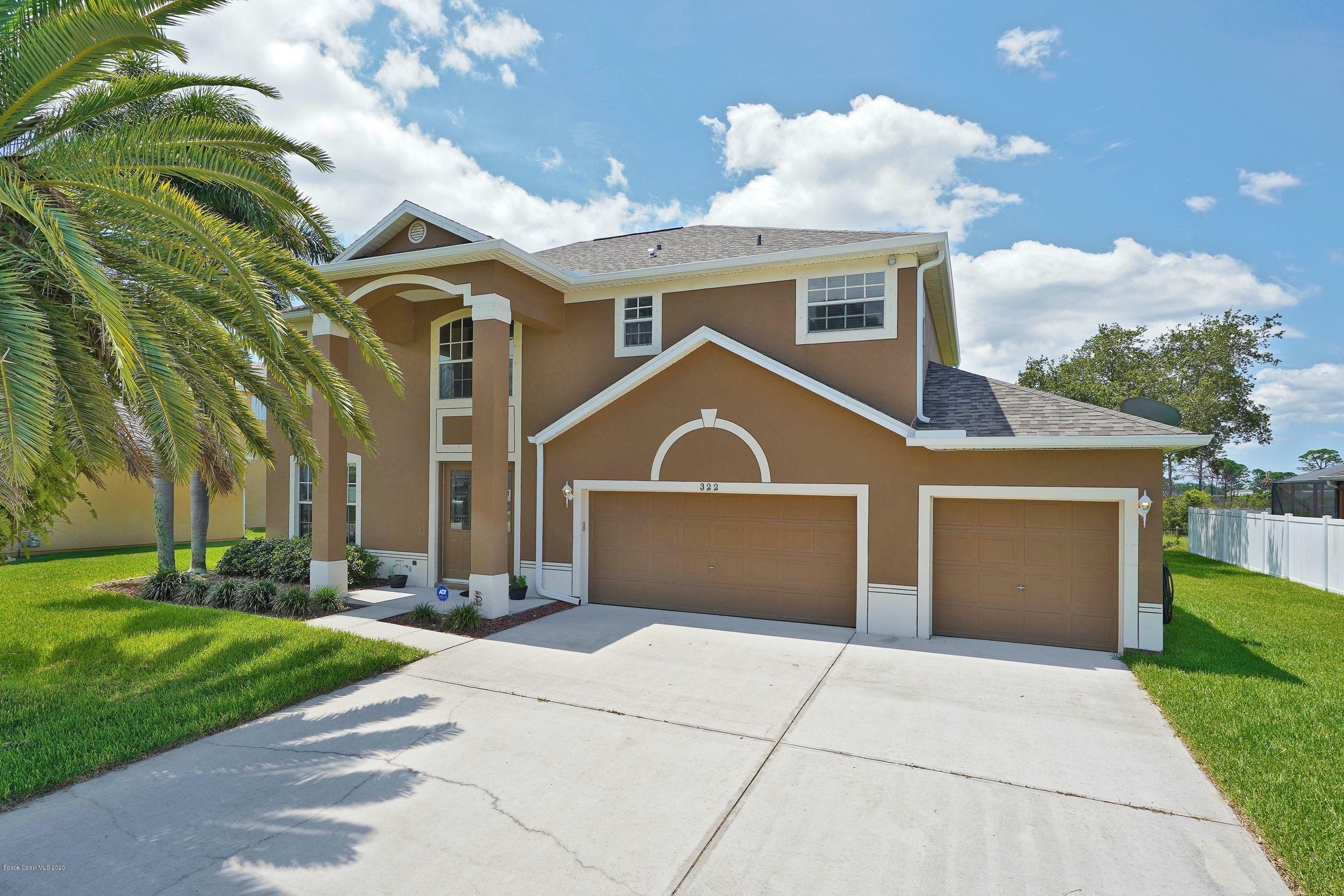 Property Photo:  322 Castlewood Lane  FL 32955 