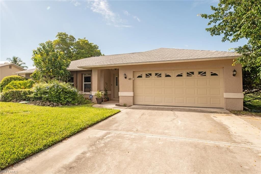 Property Photo: 49 Willoughby Dr FL 34110