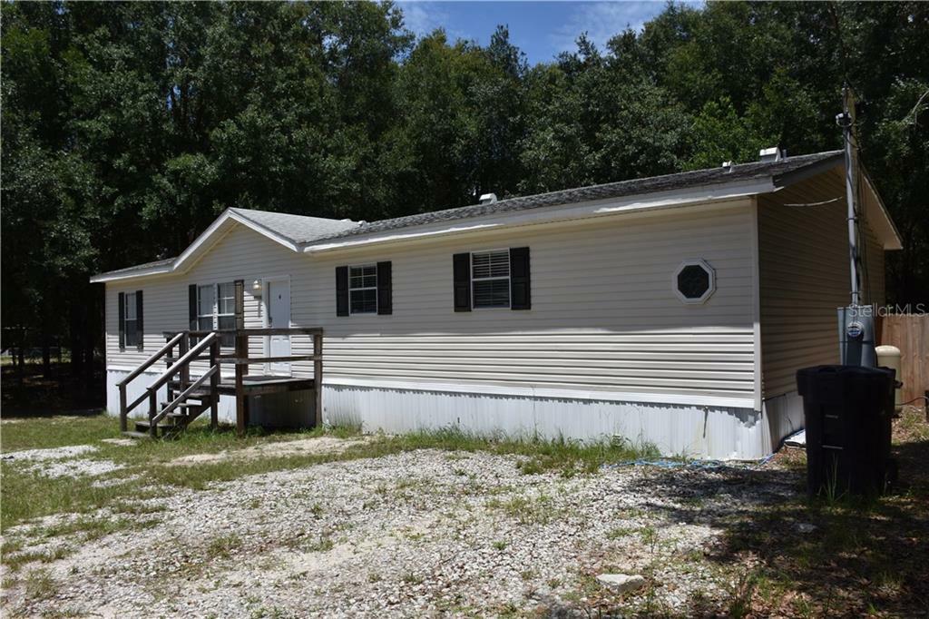 Property Photo:  45920 Michigan Road  FL 32702 