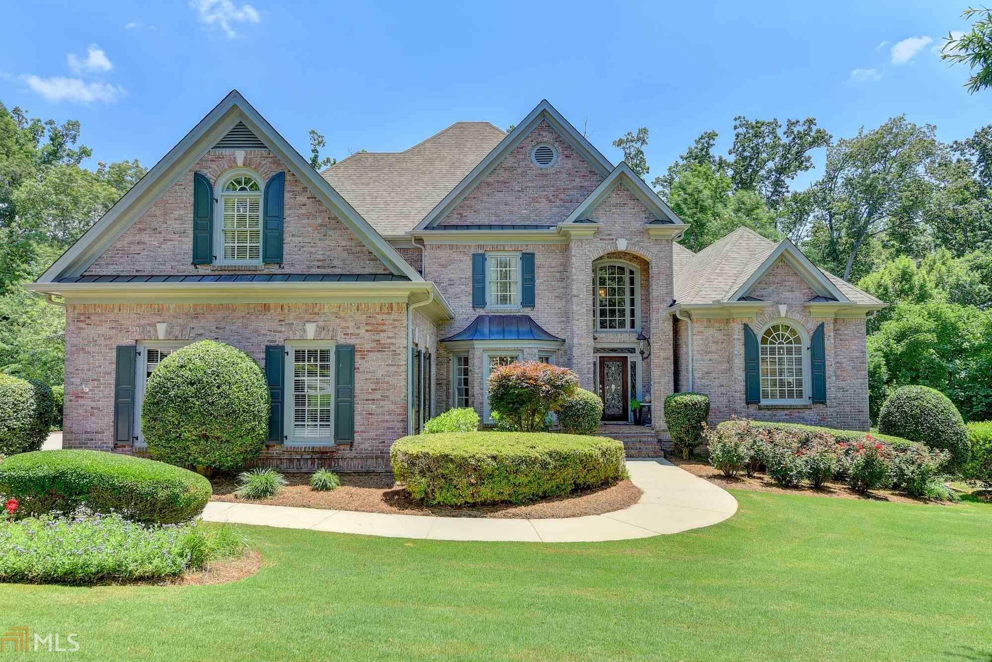 Property Photo:  7095 Laurel Oak  GA 30024 