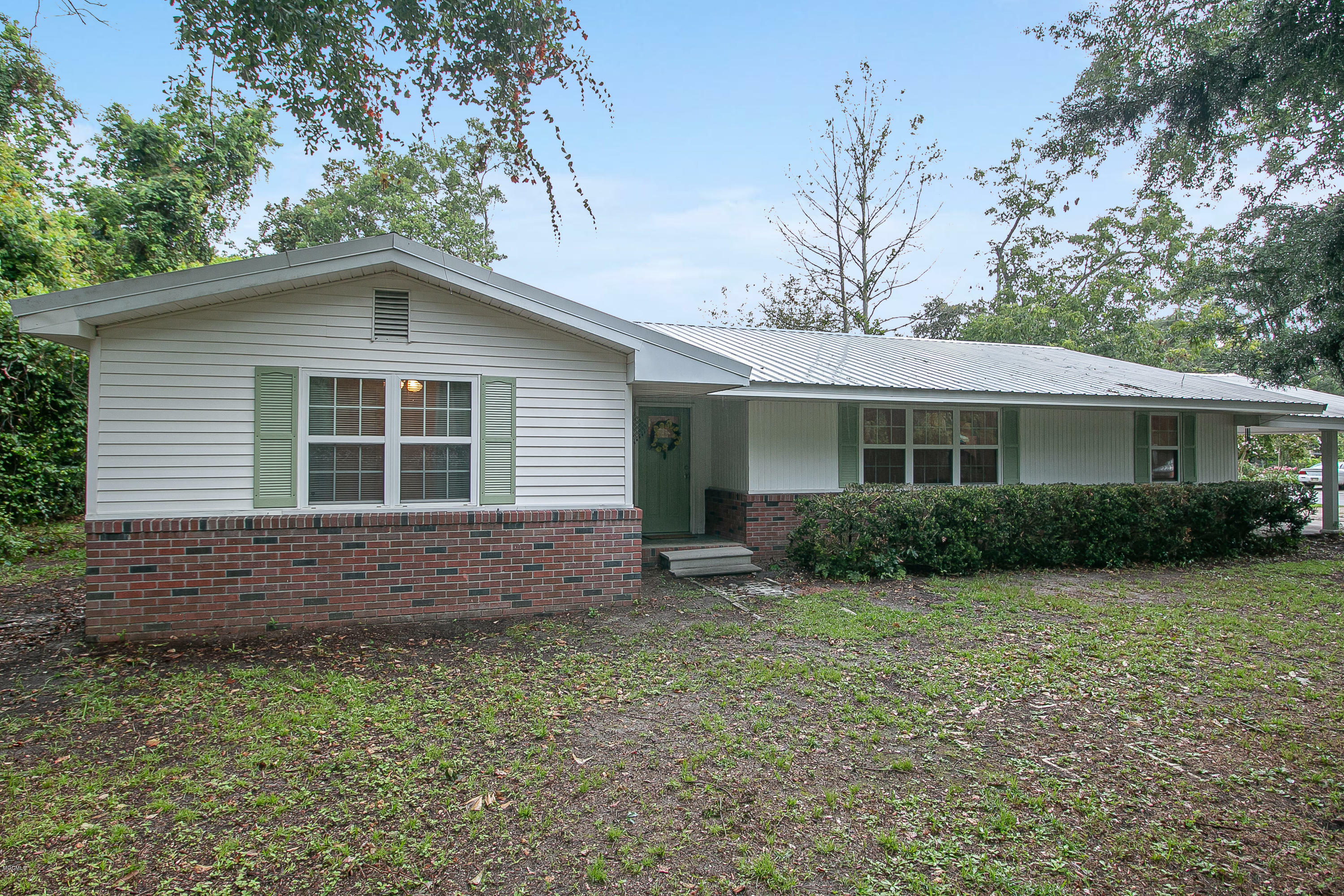 Property Photo:  310 E Old Pass Road  MS 39560 