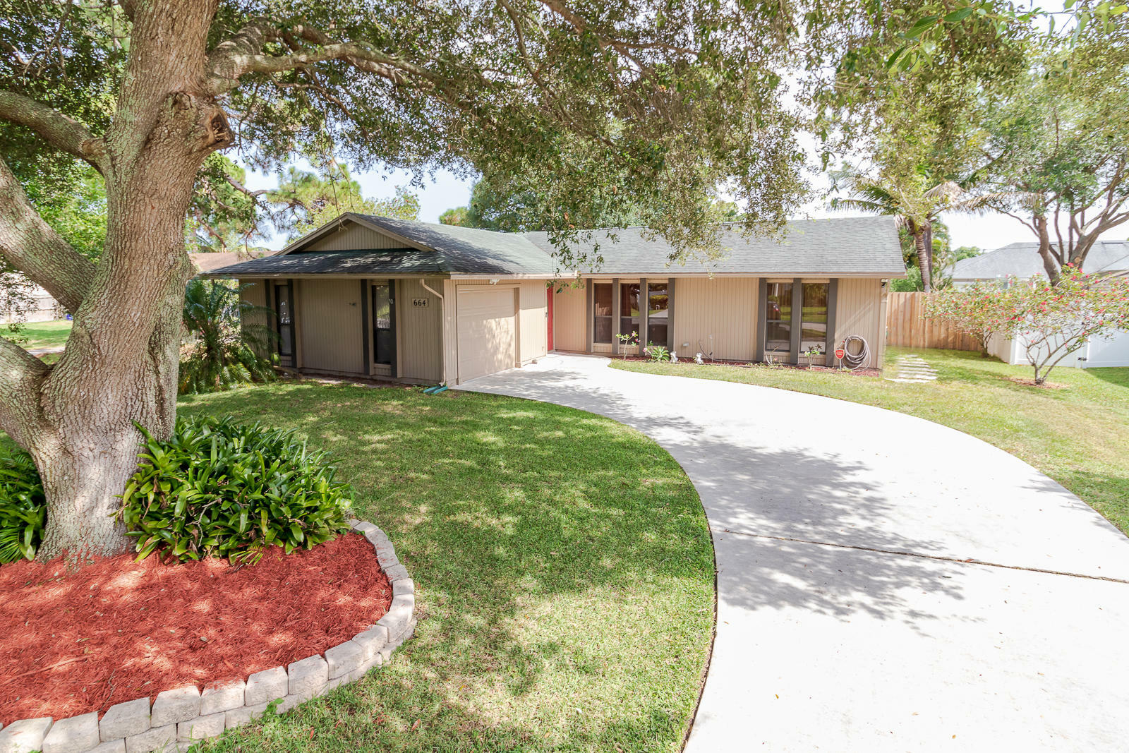 Property Photo:  664 SW Ray Avenue  FL 34983 