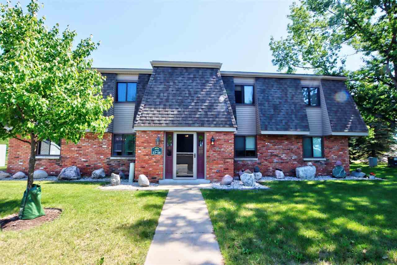 Property Photo: 915 Robinson Unit 14 MI 49712