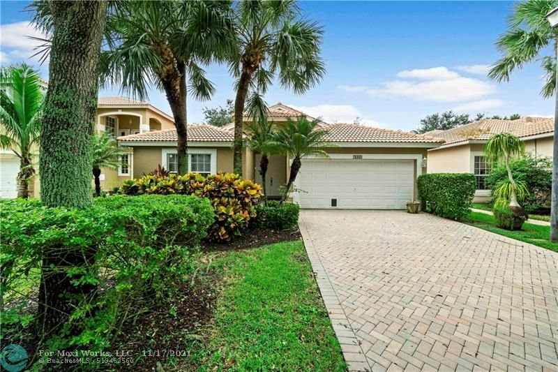 Property Photo:  7603 NW 60th Ln  FL 33067 