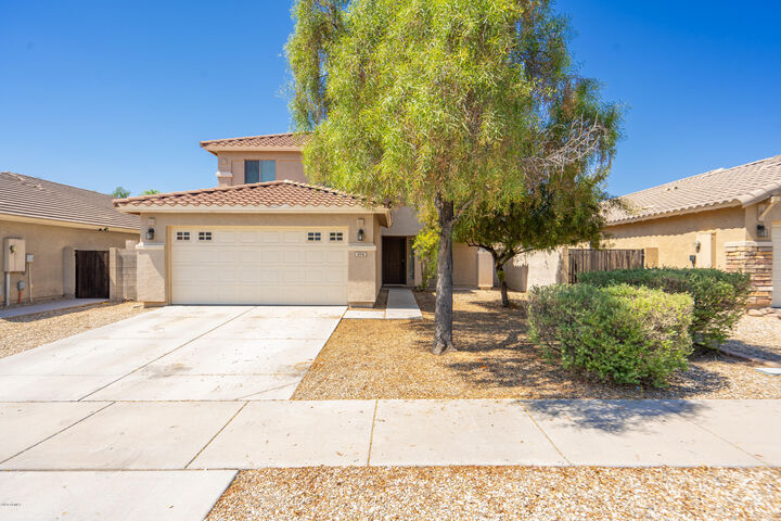 Property Photo:  574 S 167th Drive  AZ 85338 