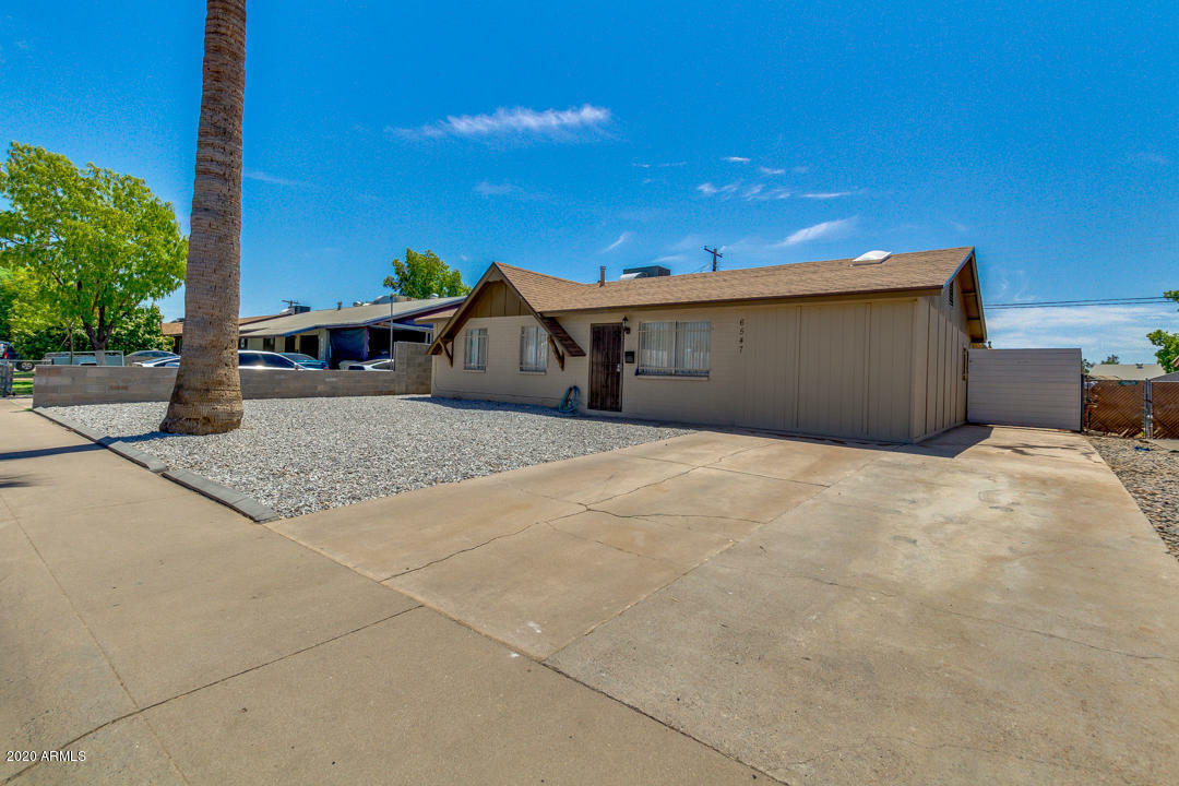 Property Photo:  6547 W Rose Lane  AZ 85301 