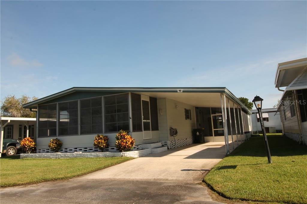 Property Photo:  1401 W Highway 50 10  FL 34711 