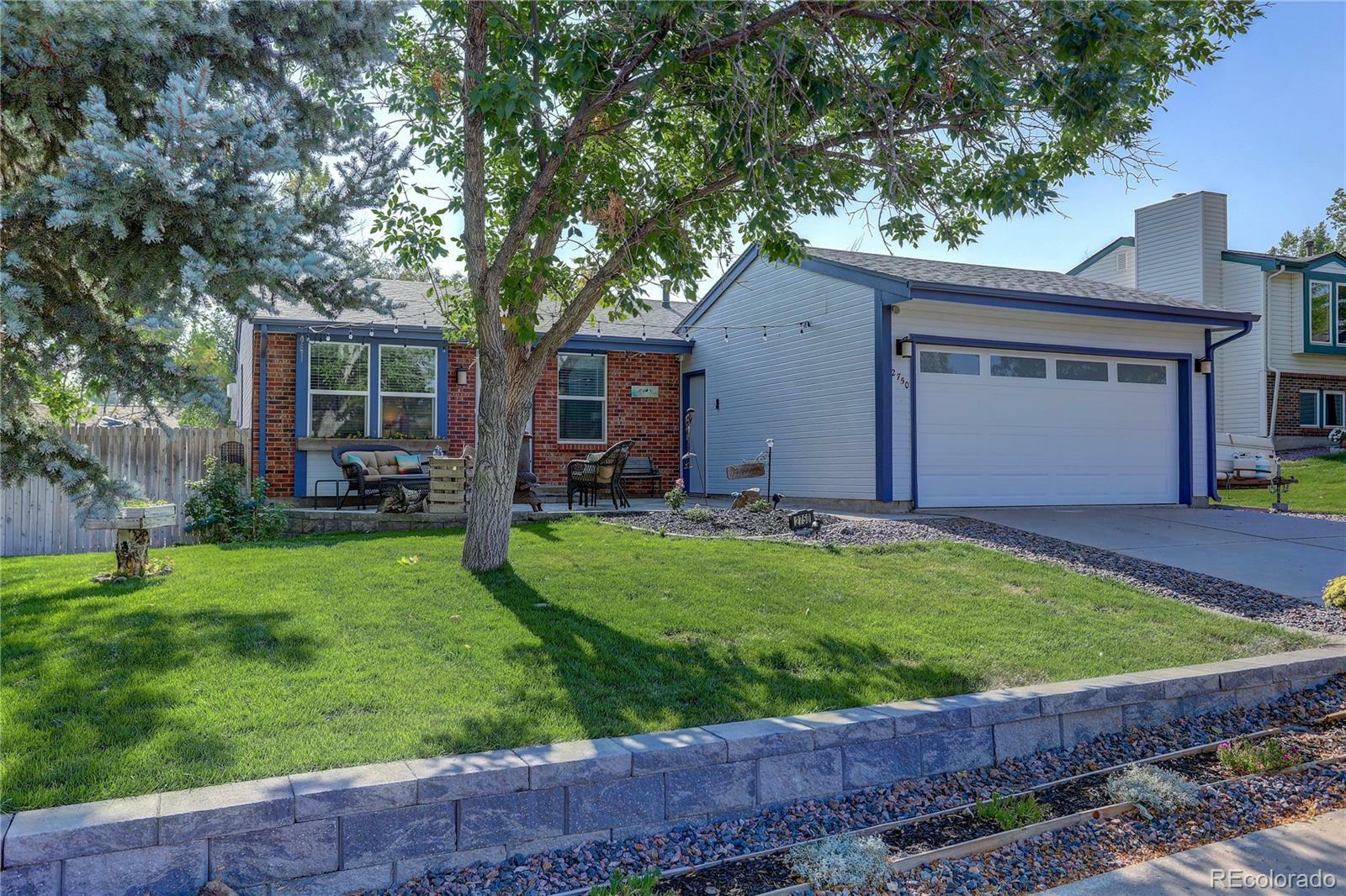 Property Photo:  2750 S Truckee Street  CO 80013 