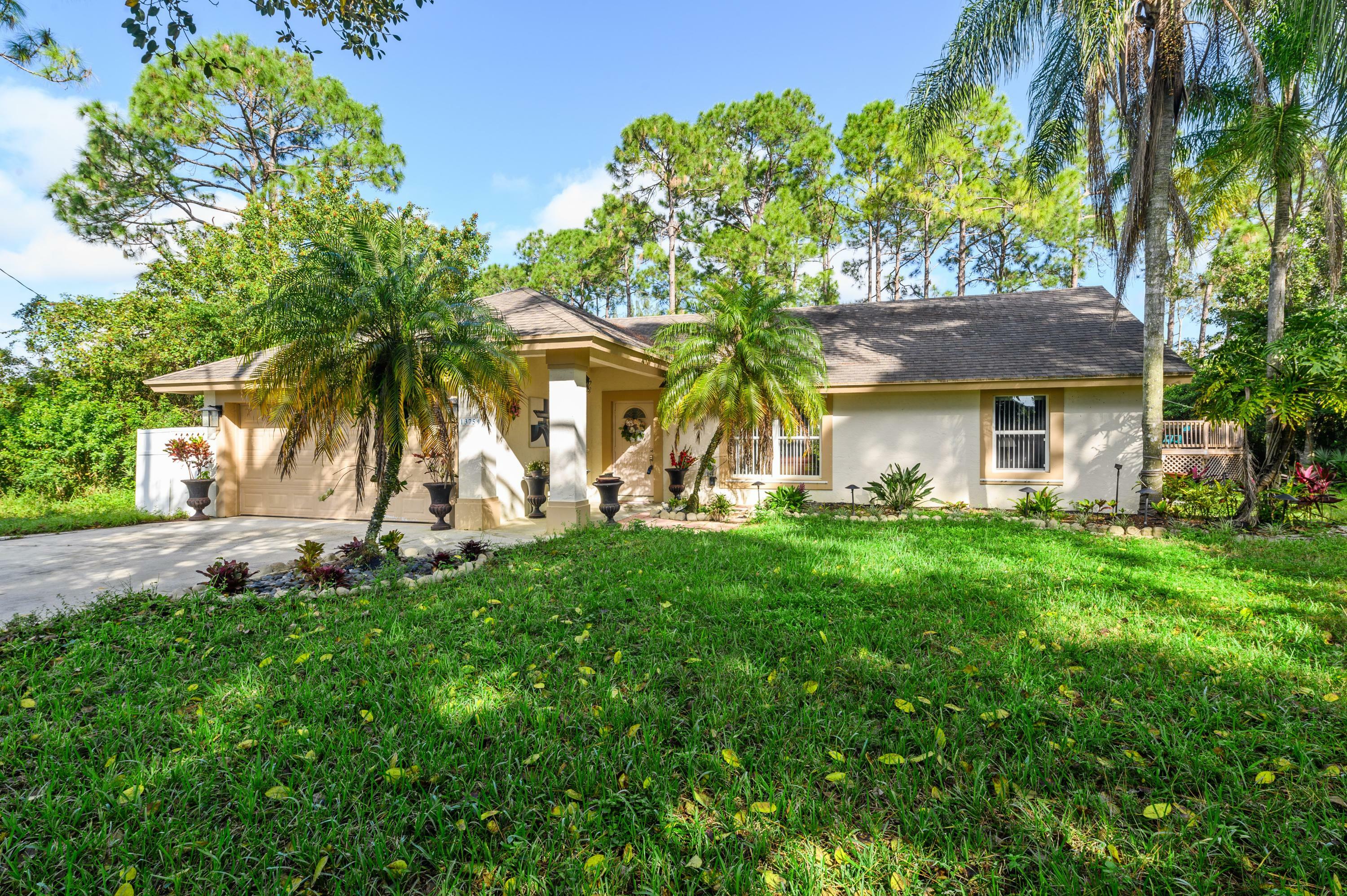Property Photo: 13759 86th Road N FL 33412