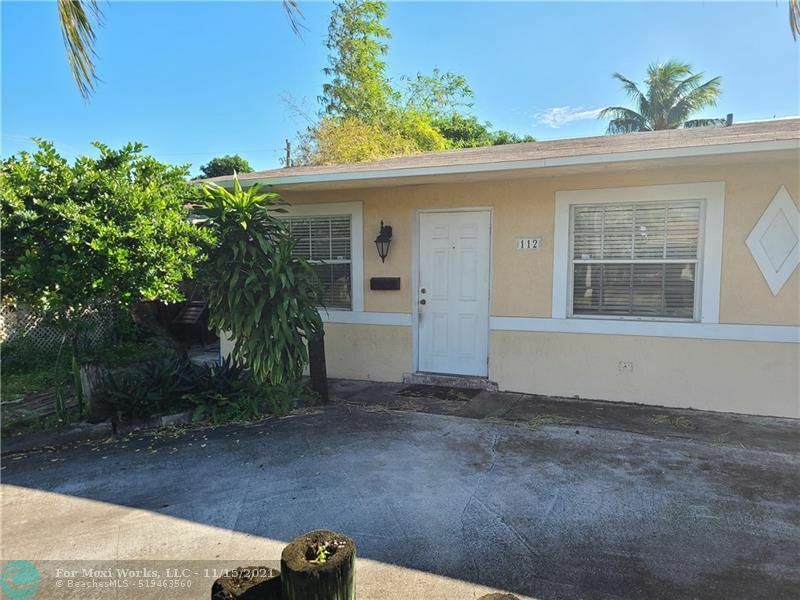 Property Photo:  112 NW 57th St  FL 33309 