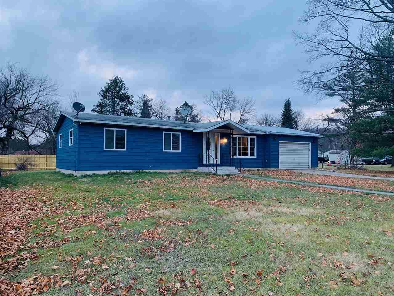 Property Photo:  705 Mill  MI 49727 