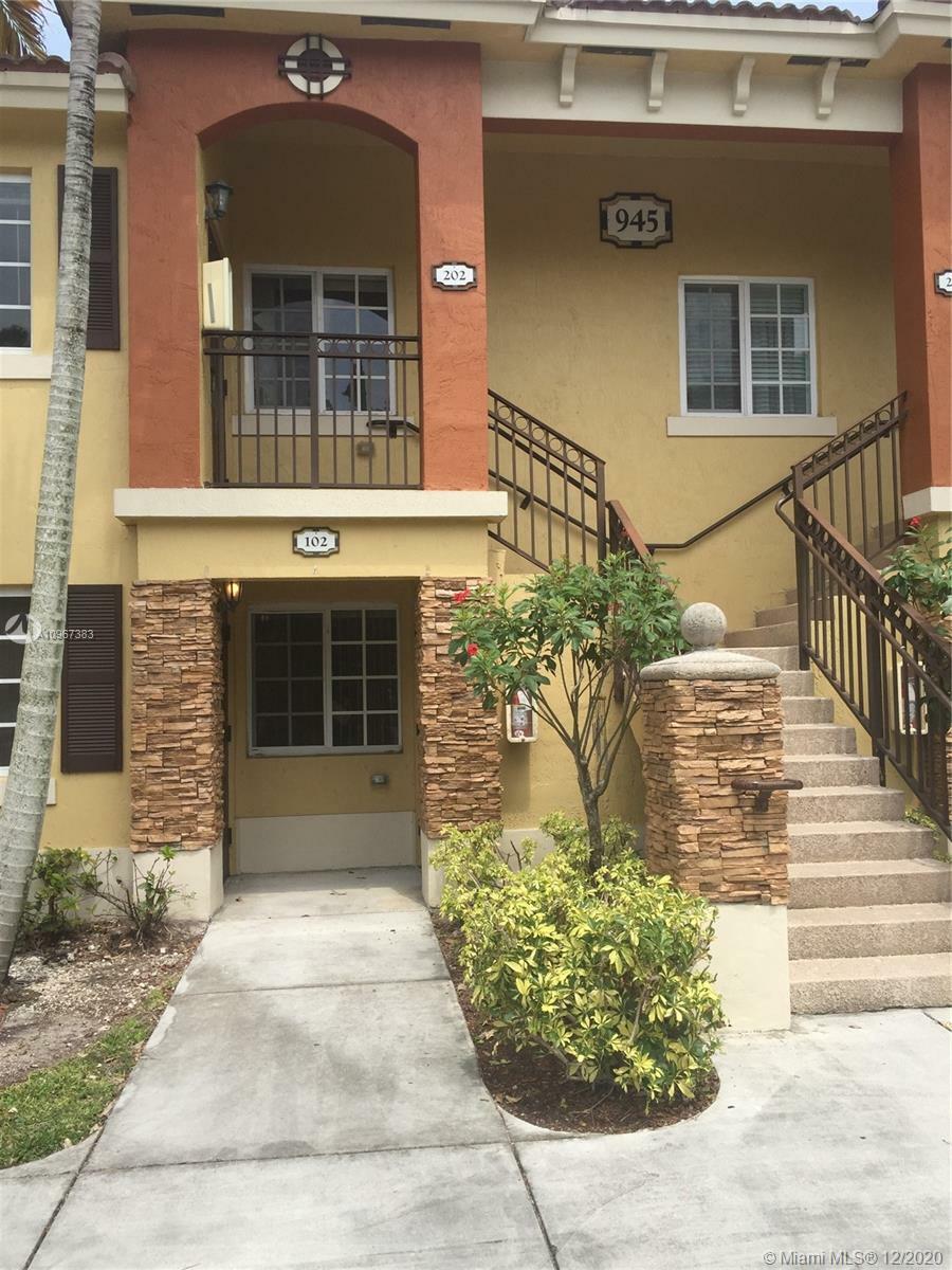 Property Photo:  945 NE 34th Ave 102  FL 33033 