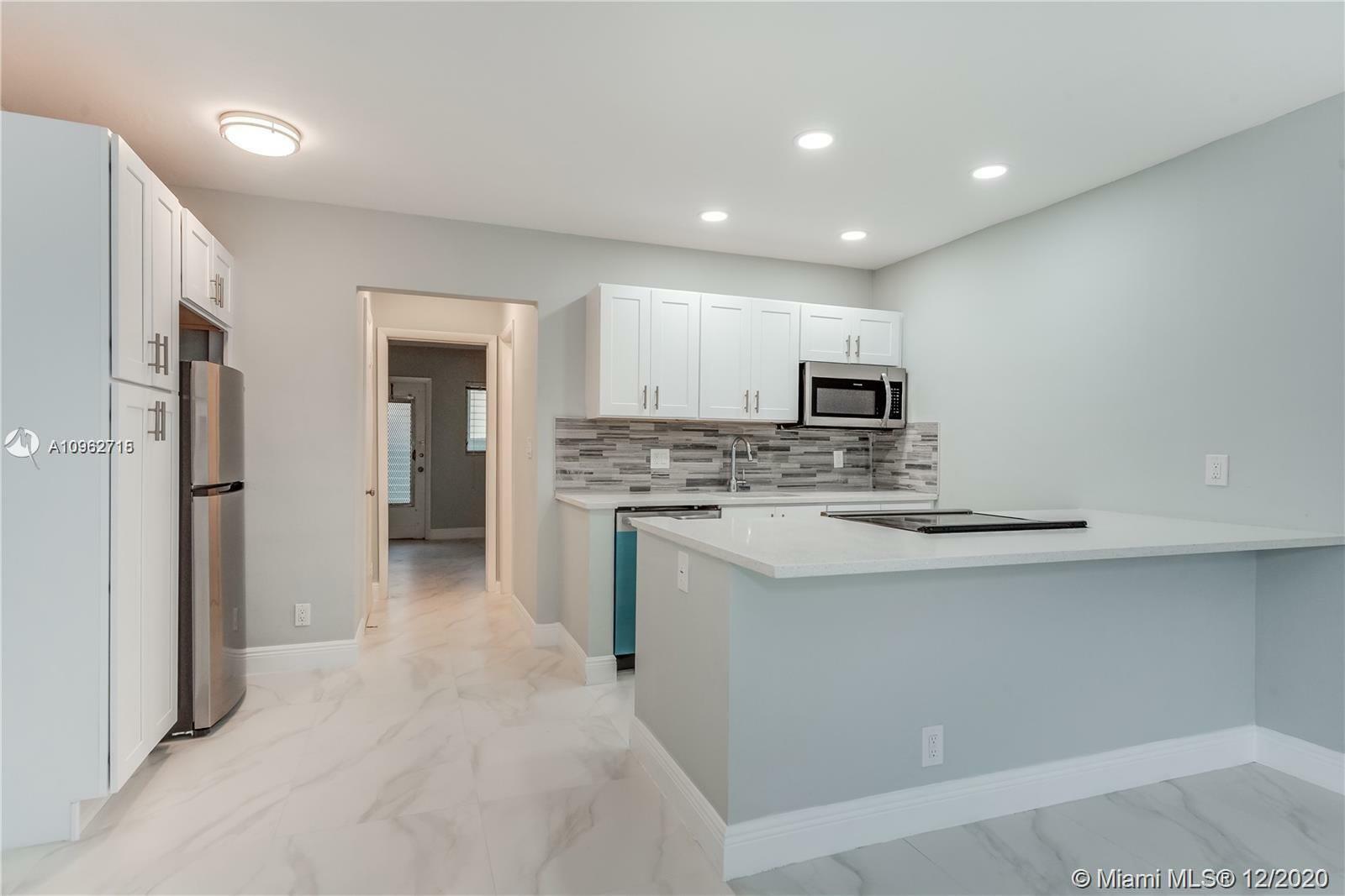 Property Photo: 2020 NE 51st Ct 109 FL 33308