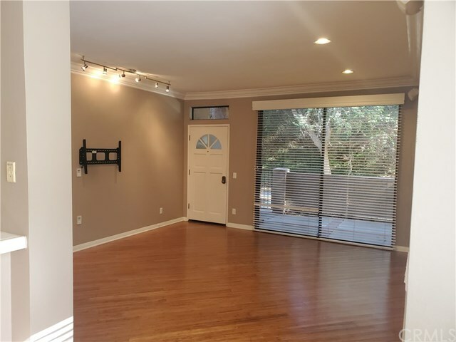 Property Photo:  155 N Singingwood Street 44  CA 92869 