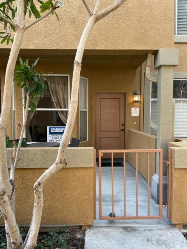 Property Photo: 19431 Rue De Valore 13H CA 92610