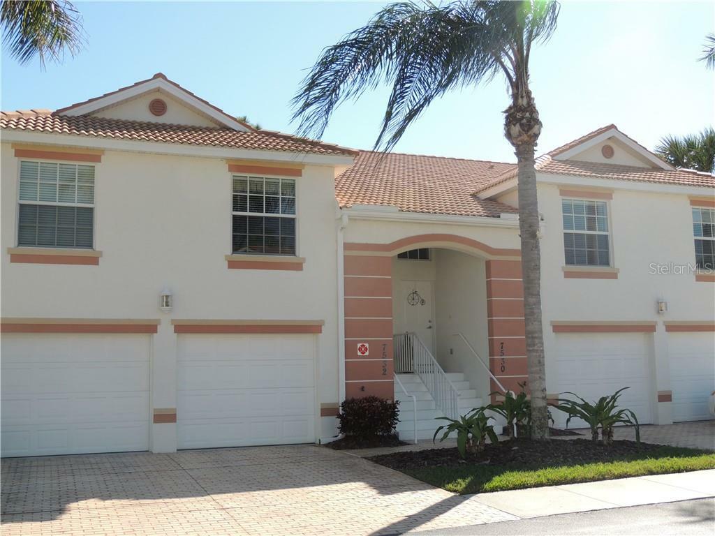 Property Photo: 7532 Marsh Orchid Circle 8-201 FL 34203