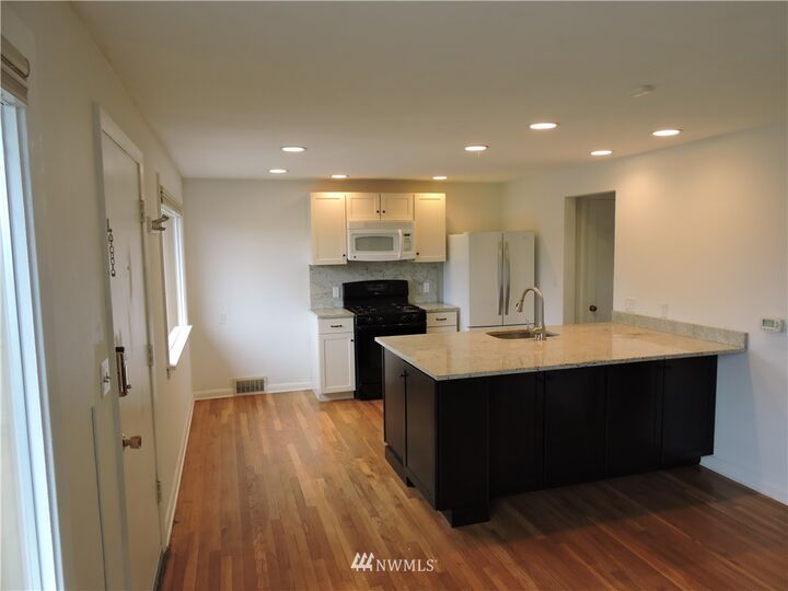 Property Photo:  6119 SW Spokane Street  WA 98116 