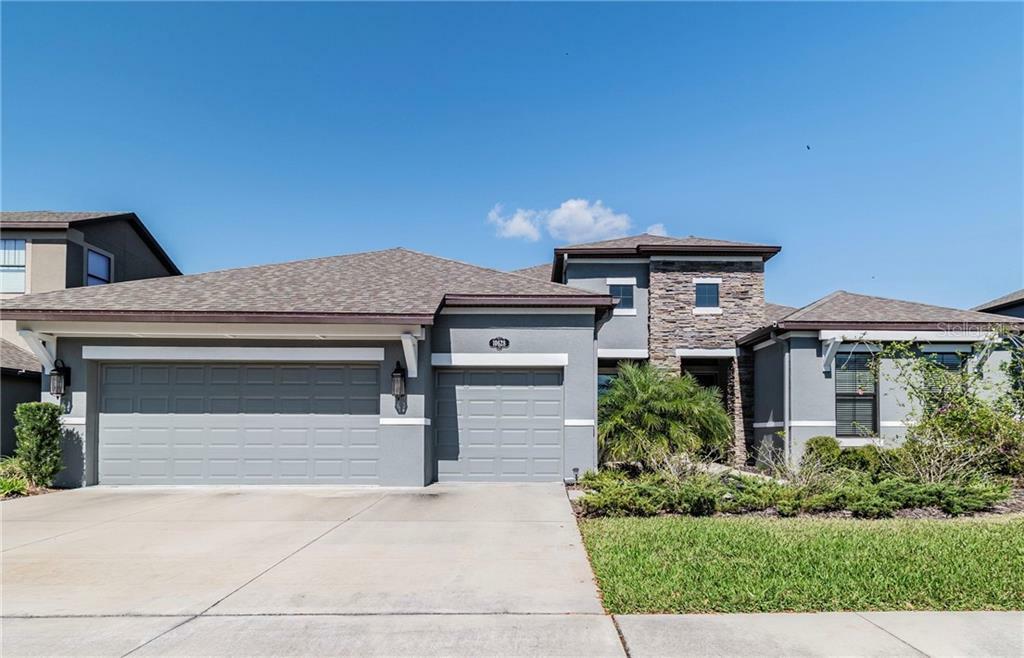 Property Photo:  10628 Mistflower Lane  FL 33647 