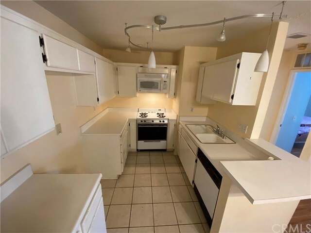 Property Photo:  12635 Briarglen K  CA 90680 