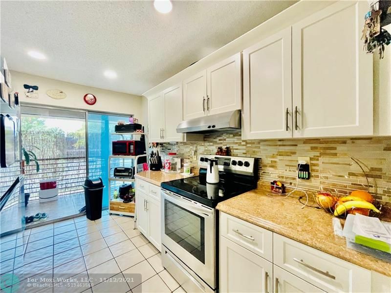 Property Photo:  2800 NE Riverside Dr 203  FL 33065 