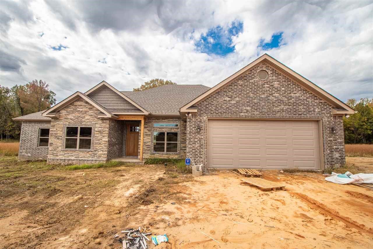 Property Photo:  21 Cr 7302  AR 72405 